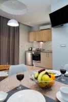 Kuchyň nebo kuchyňský kout v ubytování NK Apartments