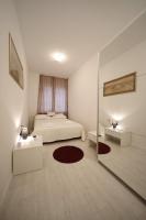 Posteľ alebo postele v izbe v ubytovaní Apartment Luci