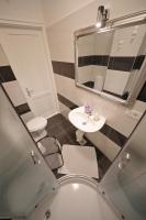 Kúpeľňa v ubytovaní Apartment Luci