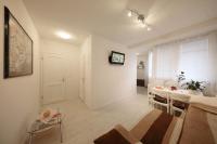 Televízia a/alebo spoločenská miestnosť v ubytovaní Apartment Luci