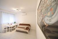 Posteľ alebo postele v izbe v ubytovaní Apartment Luci