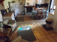 an aerial view of a living room with a fireplace at Les Chouettes in Callac