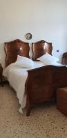 A bed or beds in a room at Glam Resort Luxury Lorenzo