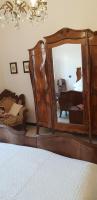 A bed or beds in a room at Glam Resort Luxury Lorenzo