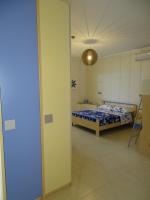 A bed or beds in a room at Linda Casa Vacanze