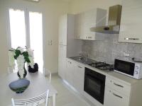 A kitchen or kitchenette at Linda Casa Vacanze