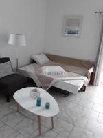 Łóżko lub łóżka w pokoju w obiekcie Marianos Apartments
