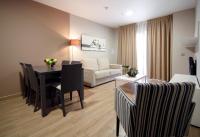 Apartahotel & Spa Jacetaniaにあるベッド