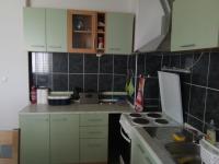 Kuchyňa alebo kuchynka v ubytovaní Apartman GRL
