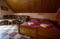 Postel nebo postele na pokoji v ubytování Penzion pod Šerákem