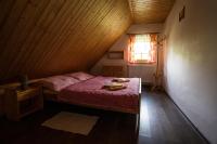 Postel nebo postele na pokoji v ubytování Penzion pod Šerákem