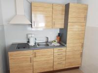 Kuchyňa alebo kuchynka v ubytovaní Apartments Palaca Sunca