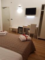 A bed or beds in a room at San Pietro