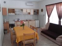 Kuchyňa alebo kuchynka v ubytovaní Apartman Vlado