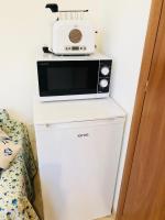 A kitchen or kitchenette at La Dolce Vita studio with free private parking