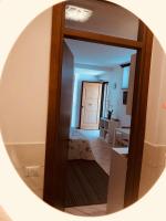 A bed or beds in a room at La Dolce Vita studio with free private parking