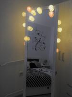 Postel nebo postele na pokoji v ubytování Sweet Dreams Apartment