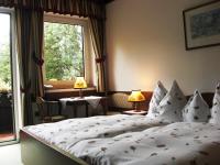 Posteľ alebo postele v izbe v ubytovaní Hotel garni Landhaus Bürtlmair