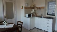 A kitchen or kitchenette at Il Fico d'India dell'Antico orto