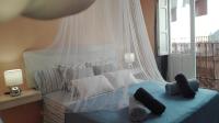 A bed or beds in a room at Apartamentos Oscar