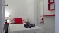 A bed or beds in a room at Apartamentos Oscar