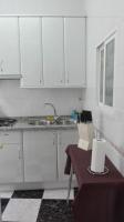 A kitchen or kitchenette at Apartamentos Oscar