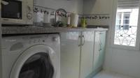 A kitchen or kitchenette at Apartamentos Oscar
