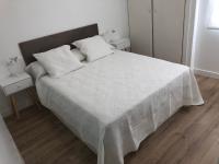 Postel nebo postele na pokoji v ubytování Nautico Beach & Golf Alicante
