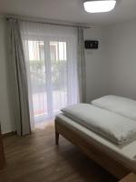 Łóżko lub łóżka w pokoju w obiekcie Ferienwohnung Imbach