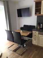 Telewizja i/lub zestaw kina domowego w obiekcie Ferienwohnung Imbach