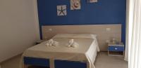 Posteľ alebo postele v izbe v ubytovaní Stella Marina Agropoli