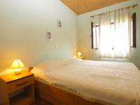 Postel nebo postele na pokoji v ubytování Apartments Maja 221