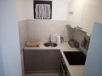 Kuchyň nebo kuchyňský kout v ubytování Apartman Pajo