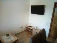 TV a/nebo společenská místnost v ubytování Apartman Pajo