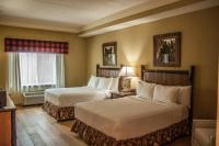 Ein Bett oder Betten in einem Zimmer der Unterkunft The Appy Lodge
