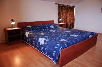 Łóżko lub łóżka w pokoju w obiekcie Apartmani Blaslov