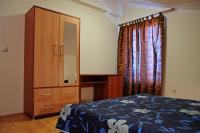 Łóżko lub łóżka w pokoju w obiekcie Apartmani Blaslov