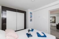 Posteľ alebo postele v izbe v ubytovaní Apartment Semi