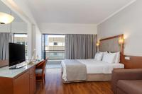 Televízia a/alebo spoločenská miestnosť v ubytovaní Best Western Plus Hotel Plaza