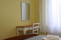 Posteľ alebo postele v izbe v ubytovaní Apartmani Palmas Rijeka