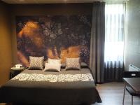 A bed or beds in a room at Motel Los Abedules