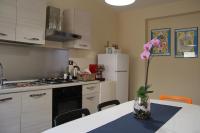 A kitchen or kitchenette at Urban Pop Bnb