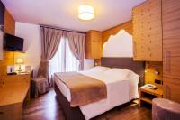 Posteľ alebo postele v izbe v ubytovaní Hotel Pilier D'Angle & Wellness