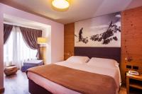 Posteľ alebo postele v izbe v ubytovaní Hotel Pilier D'Angle & Wellness