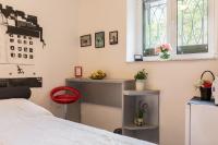 Posteľ alebo postele v izbe v ubytovaní Guest House Beach & City