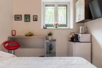 Posteľ alebo postele v izbe v ubytovaní Guest House Beach & City