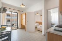 A kitchen or kitchenette at Kardamena Holiday Apartments