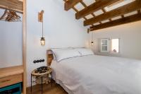 Posteľ alebo postele v izbe v ubytovaní Nao Catedral Boutique Hotel