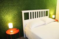 A bed or beds in a room at Urban Pop Bnb