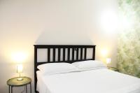 A bed or beds in a room at Urban Pop Bnb